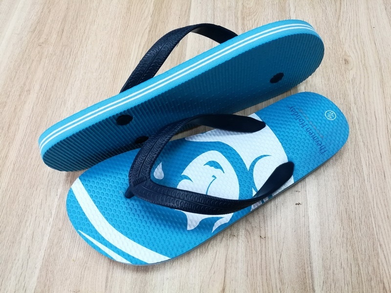 Rubber teenslipper met zool bedrukking